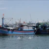 Des bateaux de pêche sont ancrés au port de pêche du quartier de Quy Nhon, province de Gia Lai. Photo: VNA