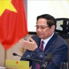 Le Premier ministre Pham Minh Chinh préside la réunion. Photo : VNA
