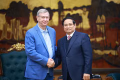 Le Premier ministre Pham Minh Chinh (droite) et Vladimir Evtouchenkov, fondateur d'AFK Sistema. Photo: VNA