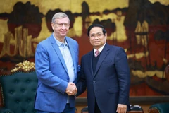Le Premier ministre Pham Minh Chinh (droite) et Vladimir Evtouchenkov, l'un des fondateurs d'AFK Sistema. Photo: VNA