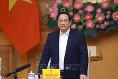 Le Premier ministre Pham Minh Chinh lors de la réunion sur la « Campagne Quang Trung », une opération éclair visant la reconstruction des habitations dévastées par les récentes catastrophes naturelles. Photo : VNA