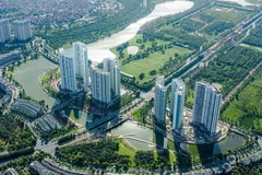 L’immobilier profite du modèle d'administration locale à deux niveaux. Photo: VNA