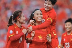 La capitaine Huynh Nhu (n° 9) marque le but portant le score à 2-0 pour l'équipe féminine vietnamienne. Photo : VNA