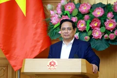 Le Premier ministre Pham Minh Chinh s'exprime lors de la réunion. Photo: VNA