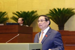Le Premier ministre Pham Minh Chinh s'exprime lors de l'ouverture de la 10ᵉ session de la 15ᵉ Assemblée nationale. Photo: VNA