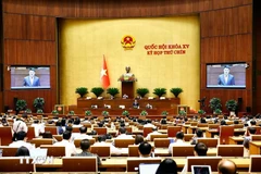 Le procureur général du Parquet populaire suprême Nguyên Huy Tiên clarifié certaines questions des députés. Photo: VNA