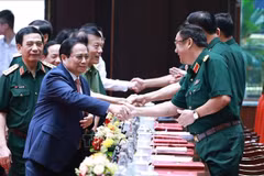 Le Premier ministre Pham Minh Chinh à la conférence politico-militaire de l'Armée. Photo: VNA