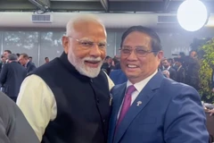 Le Premier ministre Pham Minh Chinh (droite) et son homologue indien Narendra Modi. Photo: VGP