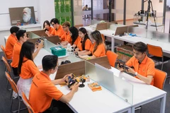 Étudiants de l'Université FPT en cours. (Photo : PV/Vietnam+)