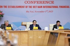 Le Premier ministre Pham Minh Chinh préside une conférence sur la création d'un centre financier international au Vietnam. Photo: VNA