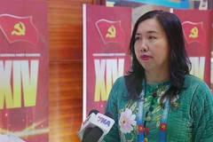 La vice-ministre des Affaires étrangères, Le Thi Thu Hang répond à presse, en marge 14ᵉ Congrès national du Parti. Photo: VNA