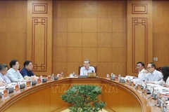 Le secrétaire général du Parti communiste du Vietnam (PCV), Tô Lâm travaille le 19 août, à Hanoï, avec le Comité central de pilotage des célébrations des grandes fêtes nationales et des événements historiques importants pour 2023-2025. Photo : VNA