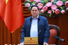 Le Premier ministre Pham Minh Chinh s'exprime lors de la réunion. Photo: VNA