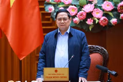 Le Premier ministre Pham Minh Chinh s'exprime lors de la réunion. Photo: VNA