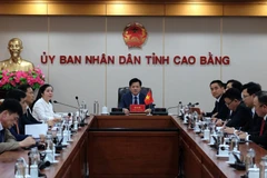 Représentants de Cao Bang lors de la réunion virturelle. Photo : VNA