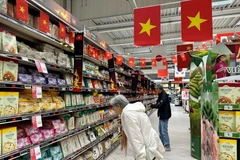 Des produits vietnamiens vendus au supermarché français. Photo: VNA