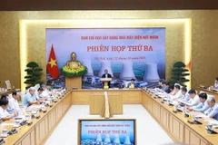 Le Premier ministre Pham Minh Chinh, chef du Comité de pilotage pour la construction de la centrale nucléaire, a présidé la troisième réunion du Comité dans l'après-midi du 22 octobre. Photo : VNA