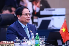 Le Premier ministre Pham Minh Chinh participe à la 3ᵉ réunion des dirigeants de la Communauté asiatique zéro émission (Asia Zero Emission Community – AZEC). Photo : VNA