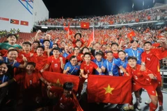 Les joueurs du Vietnam U22 exultent après leur victoire. Photo: VNA