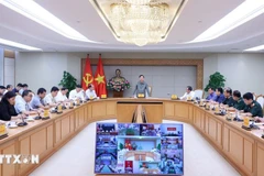 Le vice-Premier ministre Trân Hông Hà s'exprime lors d'une réunion tenue le matin du 20 juillet à Hanoï avec les ministères, secteurs et localités concernés pour faire face au typhon n°3. Photo: VNA