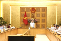 Le vice-Premier ministre permanent Nguyen Hoa Binh lors de la réunion. Photo : VGP