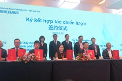 Des entreprises vietnamiennes et chinoises signent un accord de coopération dans les domaines de la science, de la technologie et de l'innovation. Photo : VNA