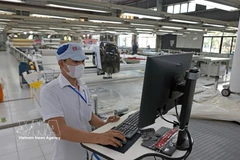 Le textile-habillement à l’export, l’un des secteurs contribuant à la croissance. Photo: VNA