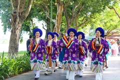 L'ancienne capitale de Huê rayonne aux couleurs d'anciens costumes traditionnels vietnamiens