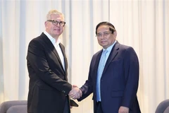 Le Premier ministre Pham Minh Chinh (droite) et le PDG d'Ericsson, Borje Ekholm. Photo: VNA