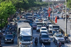 Les émissions des véhicules sont l'une des causes de la pollution atmosphérique dans les grandes villes. Photo : nhandan.vn