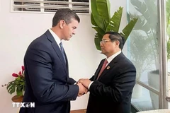 À l'occasion de sa participation au sommet du G20 à Rio de Janeiro (Brésil), le Premier ministre Pham Minh Chinh (droite) a rencontré le 19 novembre 2024 le président paraguayen Santiago Pena. Photo: VNA 