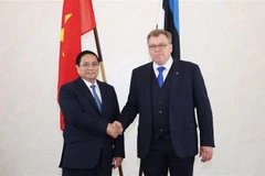Le Premier ministre vietnamien, Pham Minh Chinh, rencontre le président du Riigikogu (Parlement estonien), Lauri Hussar (à droite), Photo : VNA