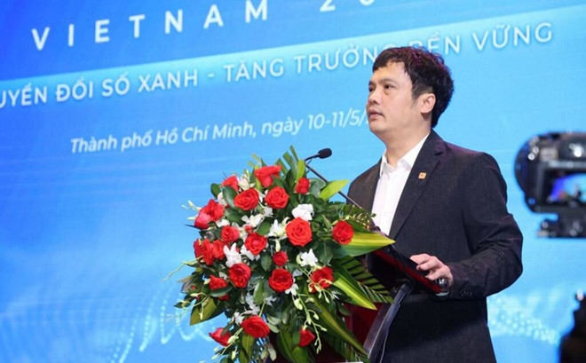 Le président de VINASA et chef du comité d’organisation de l'événement, Nguyên Van Khoa, prend la parole lors de la cérémonie d'ouverture. Photo: CTV/CVN 154531-chuyen-doi-so-2.jpg
