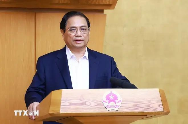 Le Premier ministre Pham Minh Chinh préside la réunion du gouvernement sur l'élaboration des lois en juillet. Photo : VNA Chinh.webp