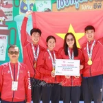 Le quatuor composé de Nguyen Huy Hoang, Vo Thi My Tien, Nguyen Kha Nhi et Mai Tran Tuan Anh. Photo : VNA