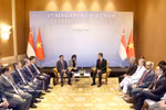 Cérémonie d'accueil solennel du permanent du Secrétariat Tran Cam Tu à Singapour. Photo: VNA