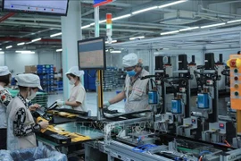 Pour atteindre une croissance à deux chiffres ces prochaines années, le Vietnam doit améliorer la qualité de ses flux d'investissements étrangers. Photo: VNA