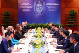 Séance de travail entre le ministre de la Sécurité publique, Luong Tam Quang et Ghada Waly, Sous-Secrétaire générale des Nations Unies et Directrice exécutive de l'UNODC. Photo: VNA
