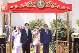 Cérémonie d’accueil en l’honneur du président vietnamien Luong Cuong. Photo: VNA