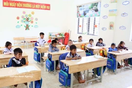 Des élèves de l'école K Ai dans la province de Quang Tri. Photo: VNA