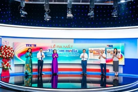 Lors de la cérémonie de lancement de la plateforme vietnammedia.vnanet.vn. Photo: VNA