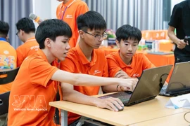 Des élèves de l'école inter-niveau FPT Ha Nam. Photo: VNA