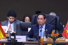 Le Premier ministre Pham Minh Chinh à la séance plénière du Sommet du G20. Photo: VNA