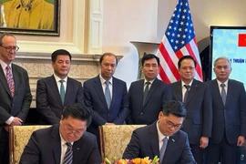 Signature des protocoles d'accord entre PV GAS, ConocoPhillips et Excelerate. Photo: VNA