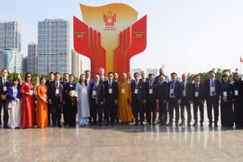 Des Vietnamiens d'outre-mer participant au 11e Congrès national d'émulation patriotique. Photo: VNA