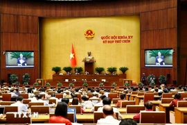 Une séance de la 9e session de l’Assemblée nationale. Photo: VNA