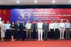 Séminaire "30 ans de relations entre Vietnam-États-Unis : Faire progresser un commerce équilibré et durable", organisé le 11 juillet à Hanoï. Photo: VNA