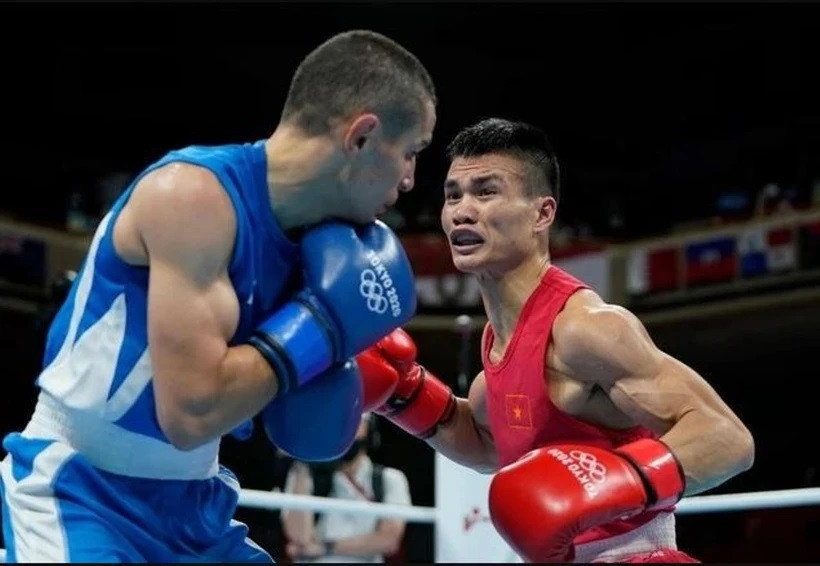 Le boxeur vietnamien Nguyên Van Duong (maillot rouge). Photo: Báo Thể thao & Văn hóa