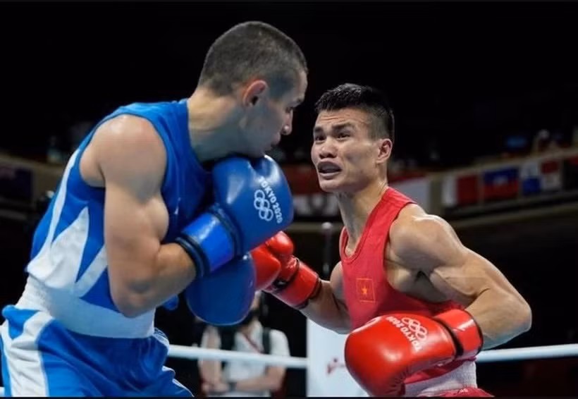 Le boxeur vietnamien Nguyên Van Duong (maillot rouge). Photo: Báo Thể thao & Văn hóa