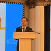 Quach Tat Liem, vice-président du Comité populaire de Phu Tho, présente les politiques incitatives de la province. Photo : VNA